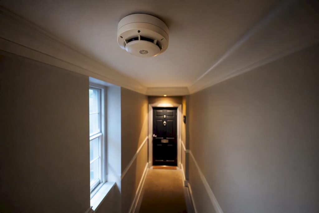 Smoke alarm in a rental property hallway